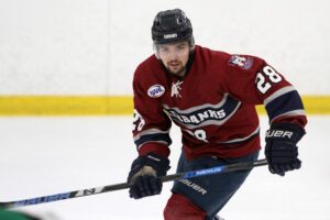 Tyler Deweese hunts a puck