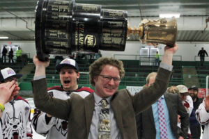 Trevor Stewart holding trophy